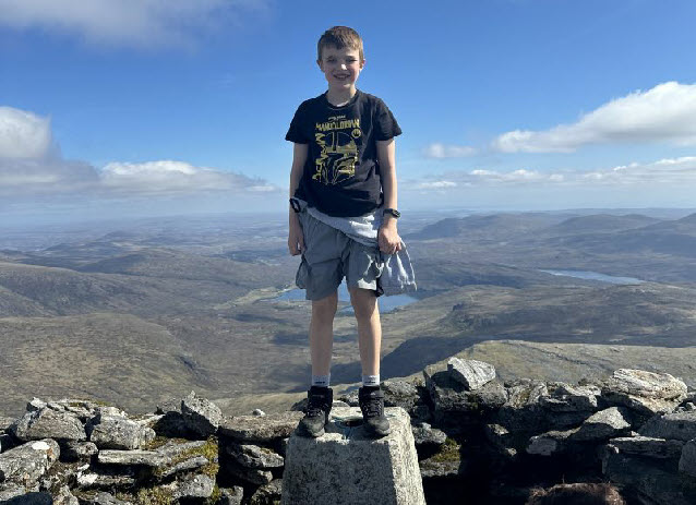 Aaron Macdonald on top of the Clisham mountain in Harris 